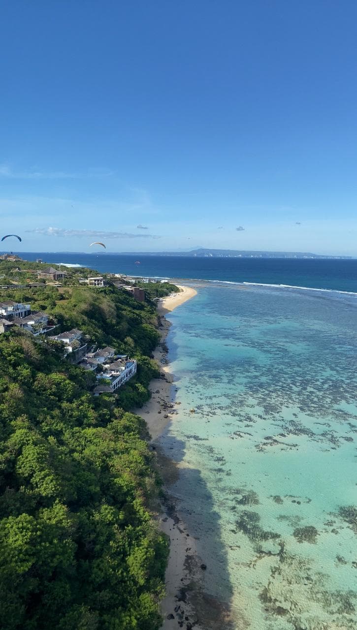 Sawangan coastline and turquoise water from above