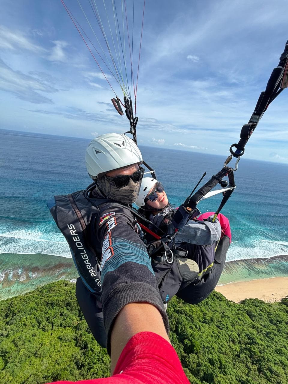 Thrilled paragliding customer